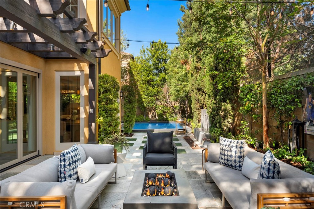 24 Tesoro Irvine, CA 92618 - Photo 25 of 75 a view of a patio with couches and a potted plant