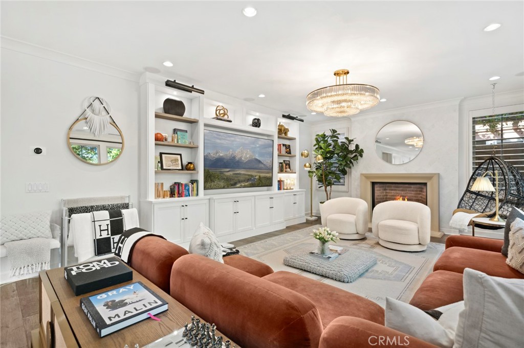 24 Tesoro Irvine, CA 92618 - Photo 36 of 75 a living room with furniture and a flat screen tv