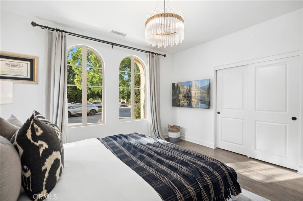 24 Tesoro Irvine, CA 92618 - Photo 39 of 75 a bedroom with a large bed and a large window