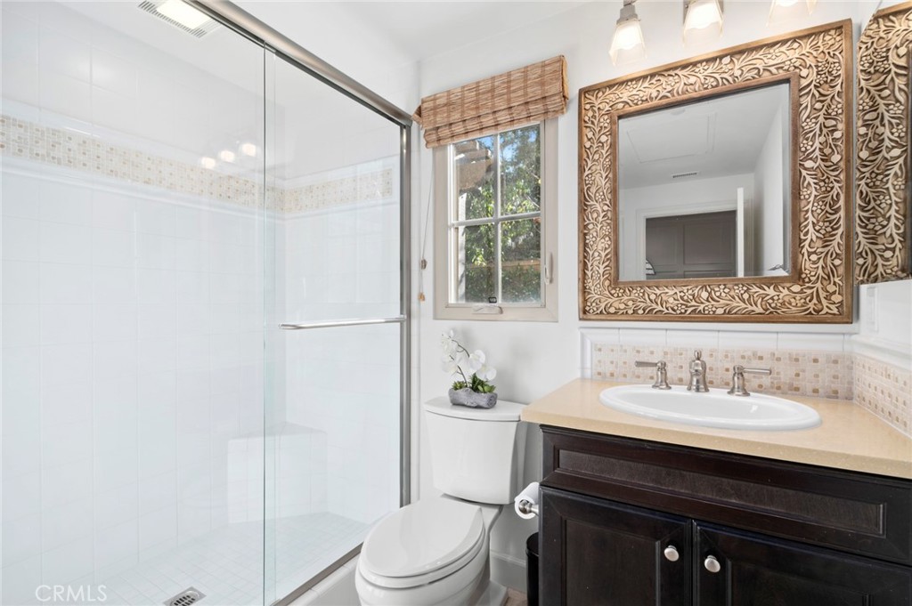 24 Tesoro Irvine, CA 92618 - Photo 40 of 75 a bathroom with a sink a toilet and shower