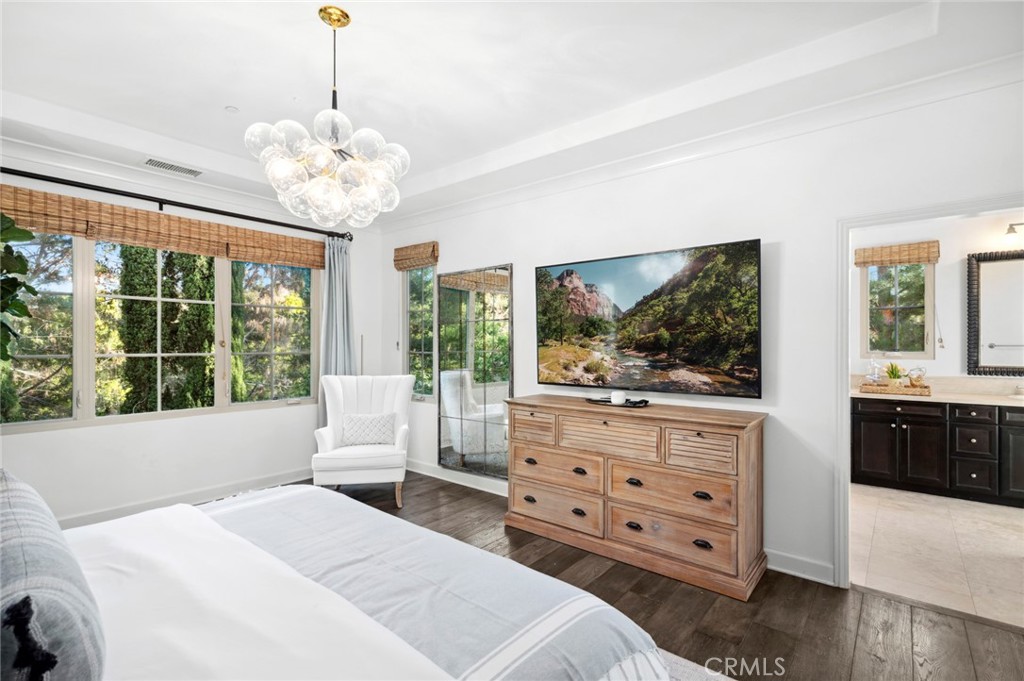 24 Tesoro Irvine, CA 92618 - Photo 44 of 75 a bedroom with a large bed and a dresser