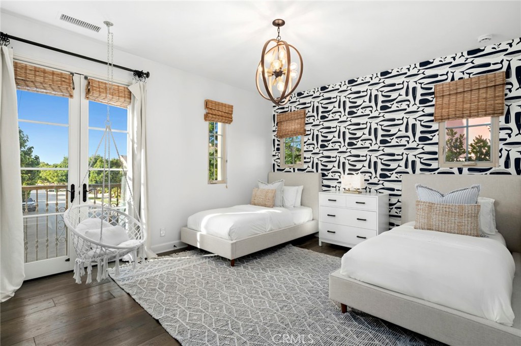 24 Tesoro Irvine, CA 92618 - Photo 48 of 75 a bedroom with two beds and a large window