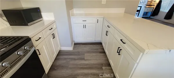 a view of a kitchen from door