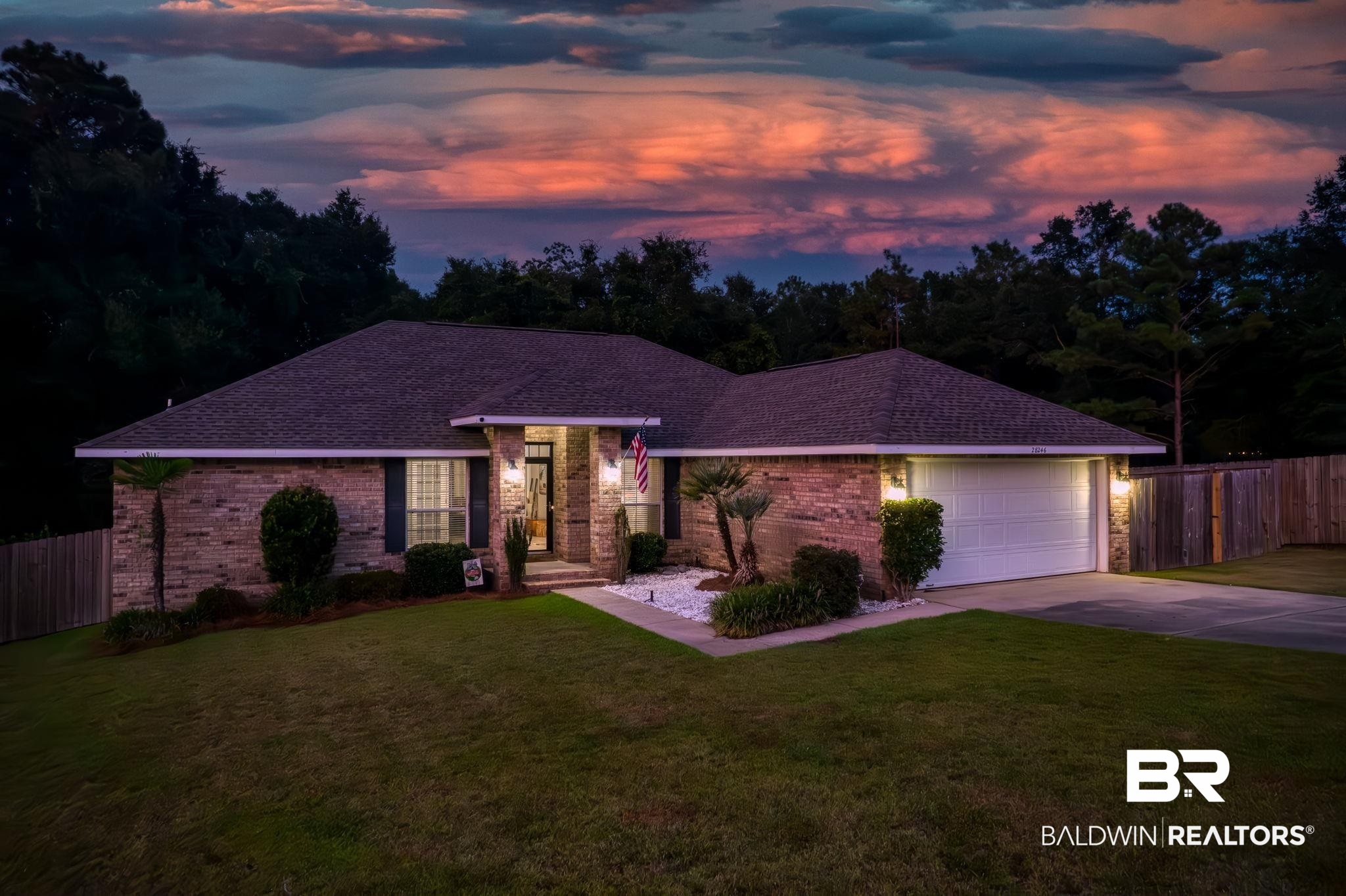 28246 Turkey Branch Drive Daphne, AL 36526 - Photo 1 of 41 Ranch-style home with a garage and a lawn