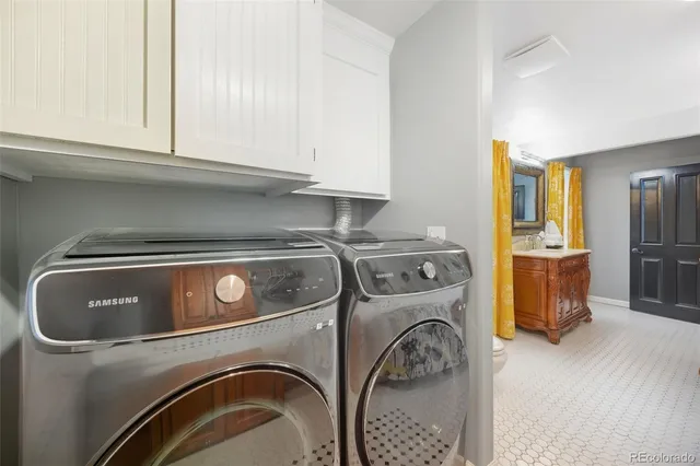 a utility room with dryer and washer