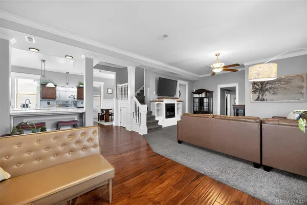 a living room with furniture and a table