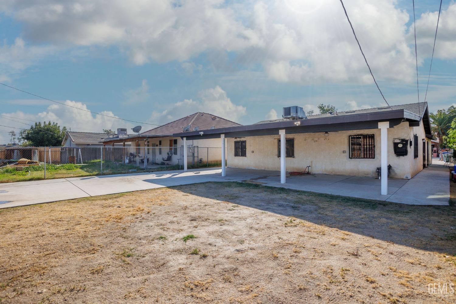 Undisclosed Address Bakersfield, CA 93307 - Photo 38 of 42 a view of a house with a park