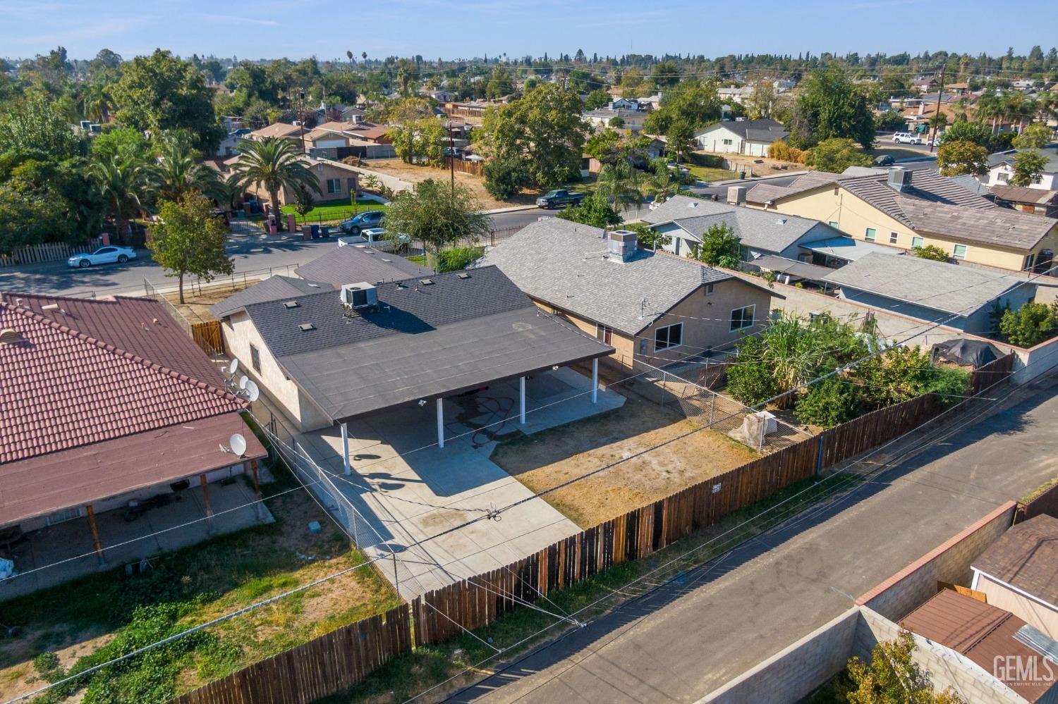 Undisclosed Address Bakersfield, CA 93307 - Photo 39 of 42 an aerial view of a house with a garden