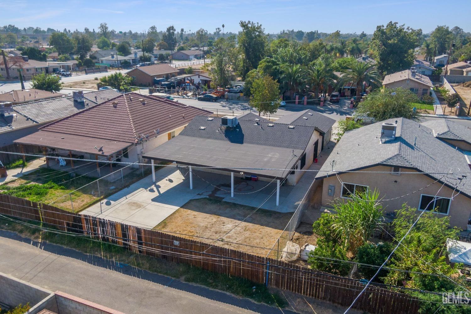Undisclosed Address Bakersfield, CA 93307 - Photo 40 of 42 an aerial view of a house with a garden