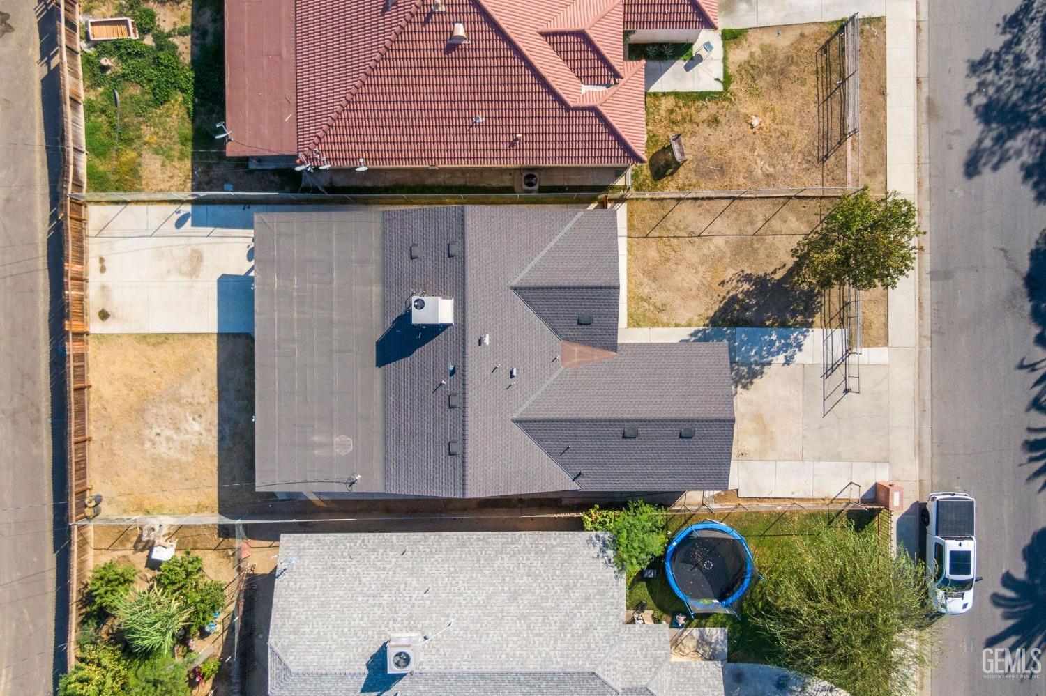 Undisclosed Address Bakersfield, CA 93307 - Photo 41 of 42 an aerial view of house with yard