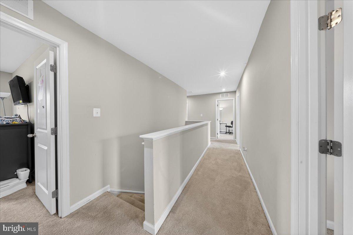 2 Ridgely Forest Drive Elkton, MD 21921 - Photo 14 of 35 a view of a hallway with wooden floor and closet