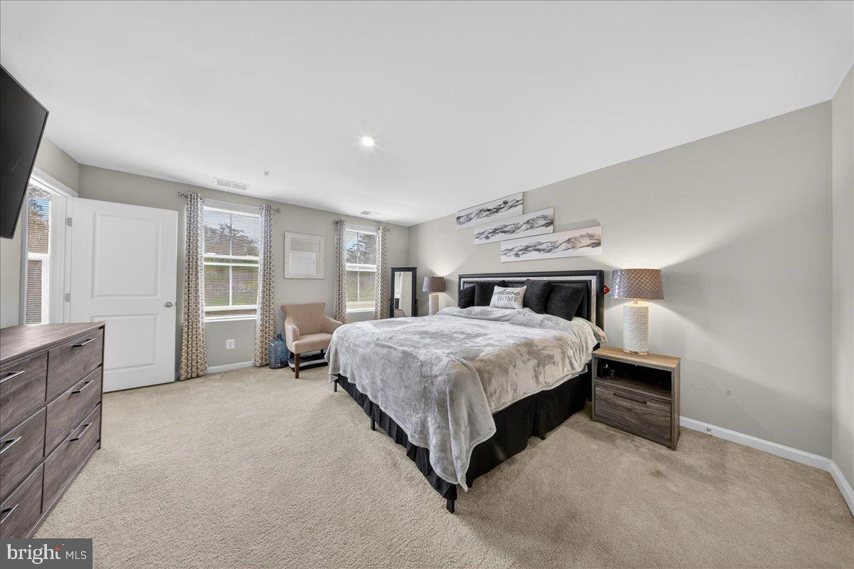 2 Ridgely Forest Drive Elkton, MD 21921 - Photo 15 of 35 a spacious bedroom with a bed and a cabinets