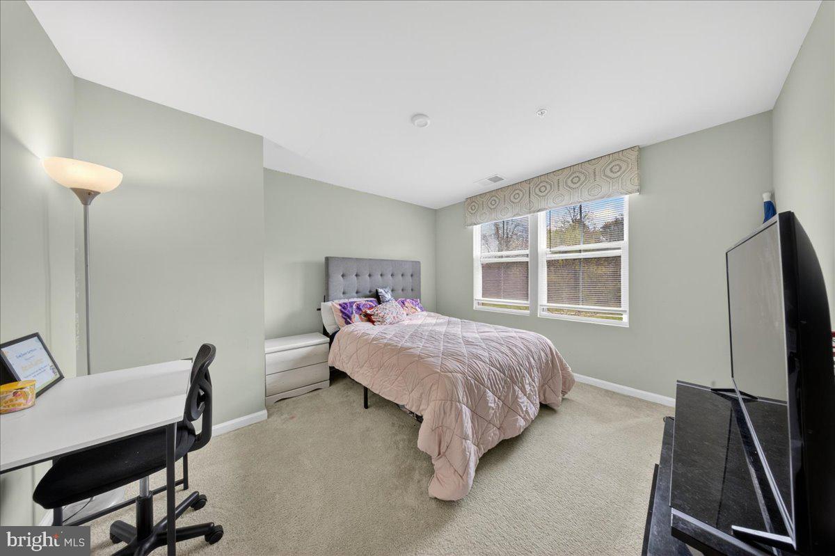 2 Ridgely Forest Drive Elkton, MD 21921 - Photo 19 of 35 a bed room with a bed tv and a window
