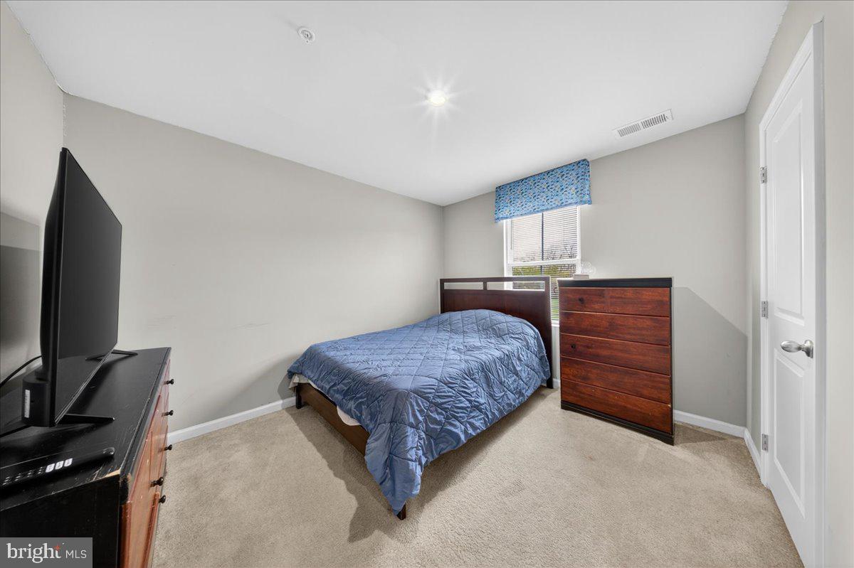 2 Ridgely Forest Drive Elkton, MD 21921 - Photo 20 of 35 a bedroom with a bed and flat screen tv