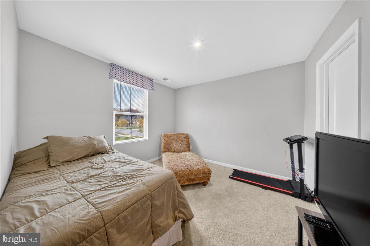 2 Ridgely Forest Drive Elkton, MD 21921 - Photo 21 of 35 a bedroom with a bed and a window