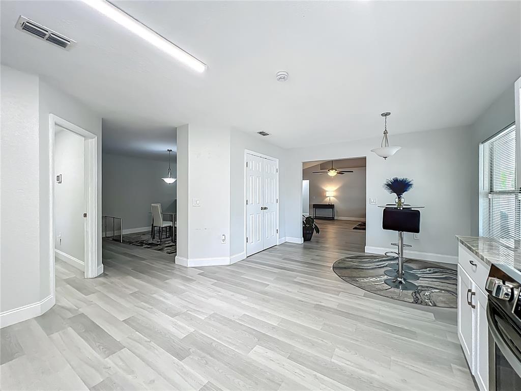 12368 Killian Street Spring Hill, FL 34609 - Photo 12 of 25 a view of a livingroom with a fireplace