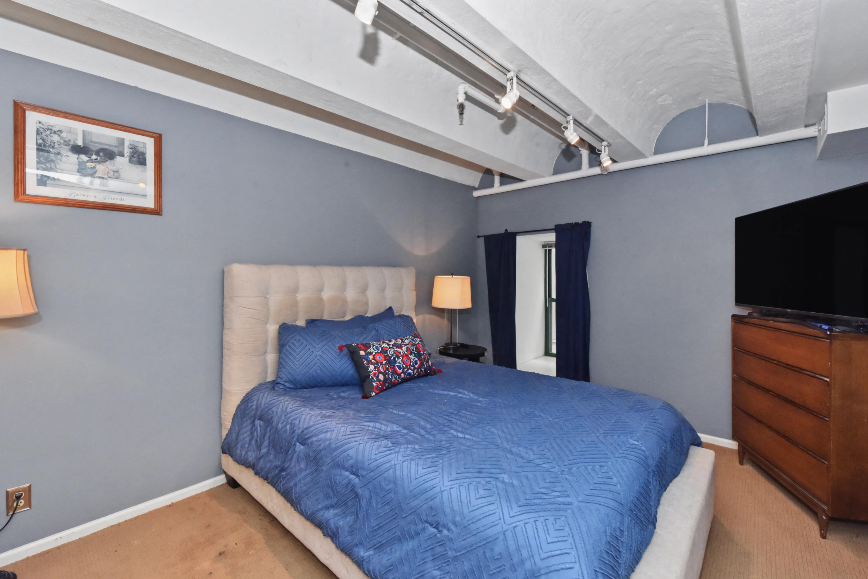 270 East Highland Avenue, Unit 224 Milwaukee, WI 53202 - Photo 12 of 36 Primary Bedroom