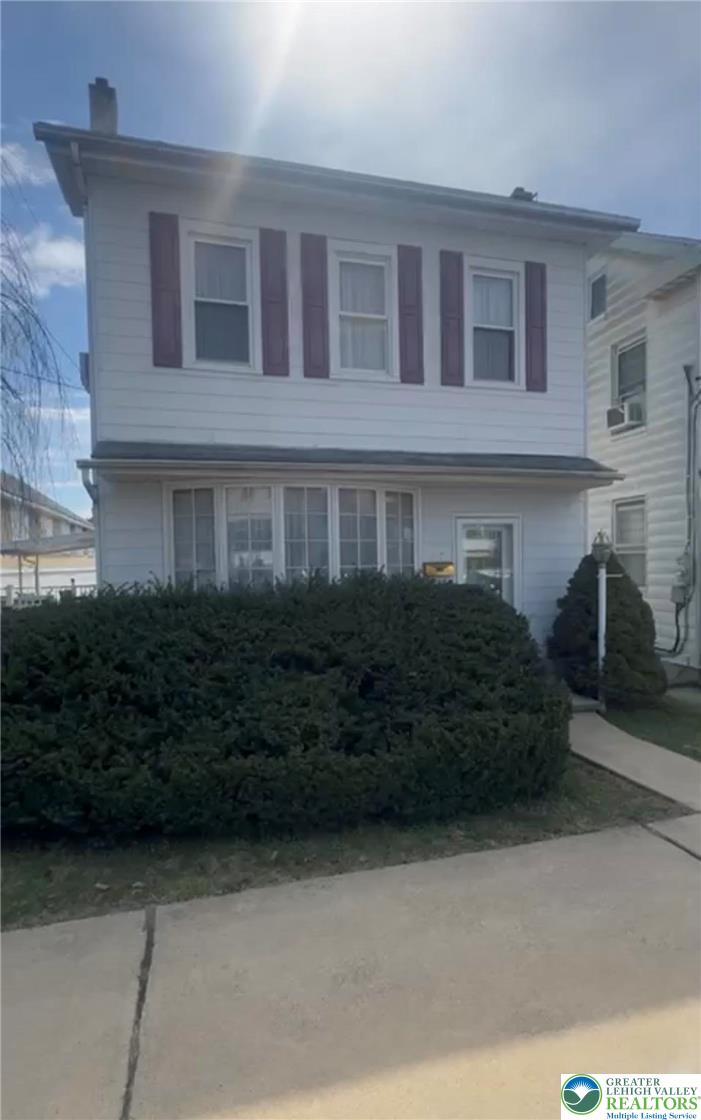 207 Chestnut Street Slatington, PA 18080 - Photo 1 of 26 a view of a house with a garden