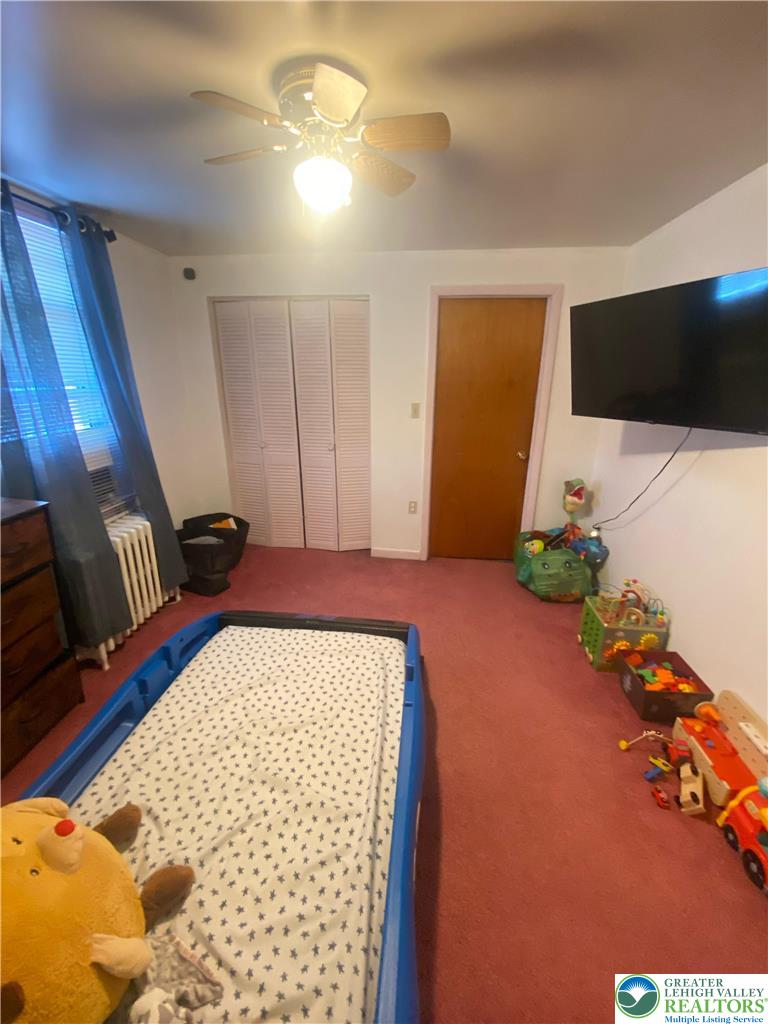 207 Chestnut Street Slatington, PA 18080 - Photo 17 of 26 a bedroom with a bed and a view of bathroom