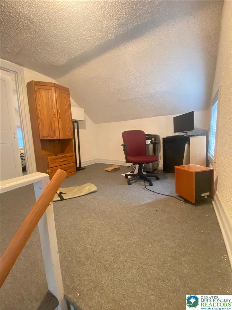 207 Chestnut Street Slatington, PA 18080 - Photo 25 of 26 a view of a workspace with a couch
