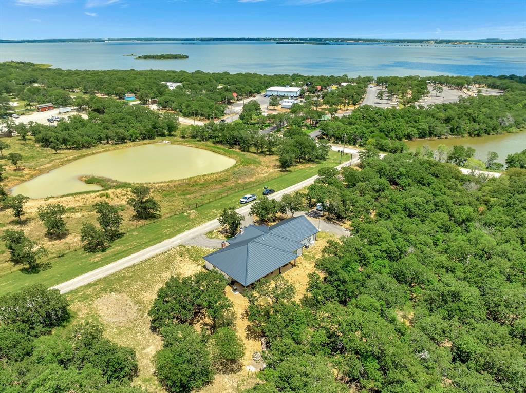 129 Whiskey Rnch Road Runaway Bay, TX 76426 - Photo 37 of 39 view of a city with an ocean
