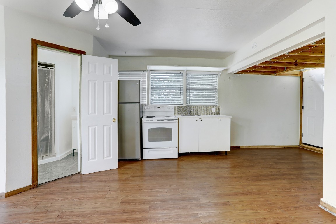 901 Newman Drive, Unit B Austin, TX 78703 - Photo 5 of 9 a utility room with washer and dryer