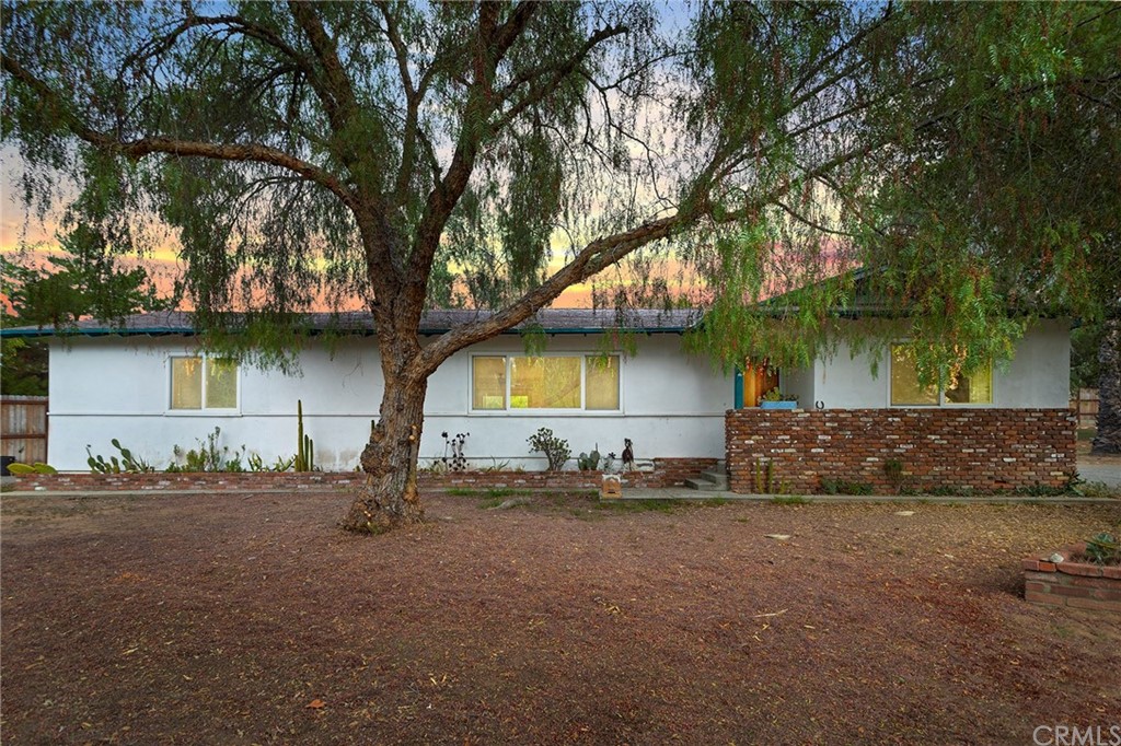 40088 Ross Road Fallbrook, CA 92028 - Photo 1 of 1 a front view of a house with a yard
