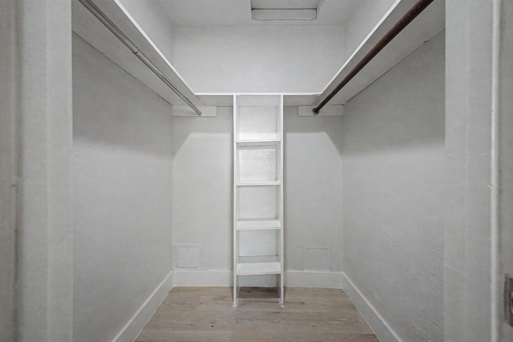 8095 Meadow Road, Unit 236 Dallas, TX 75231 - Photo 18 of 25 a view of walk in closet