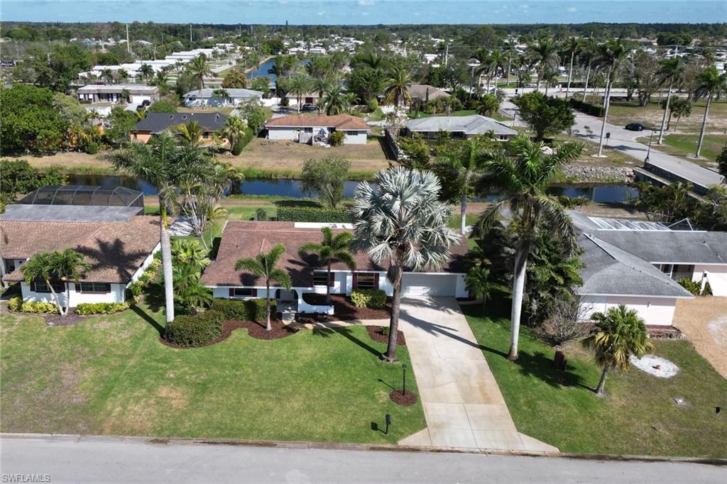 103 Doral Circle Naples, FL 34113 - Photo 2 of 25 an aerial view of multiple house