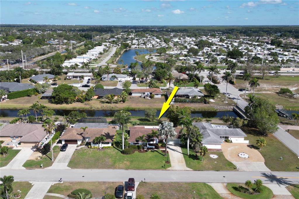103 Doral Circle Naples, FL 34113 - Photo 23 of 25 an aerial view of a building with outdoor space