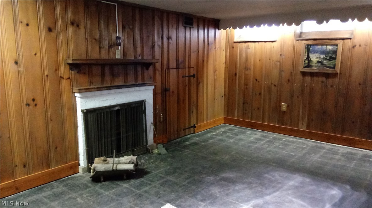 4181 Bushnell Road University Heights, OH 44118 - Photo 21 of 22 Lower level rec room with fireplace.