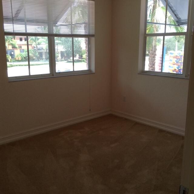 4610 PGA Boulevard, Unit 305 Palm Beach Gardens, FL 33418 - Photo 3 of 10 an empty room with a window