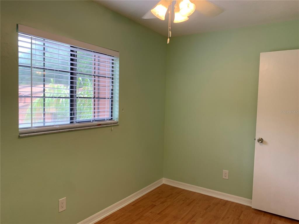 5754 Southwest 8th Place Gainesville, FL 32607 - Photo 18 of 29 an empty room with a window