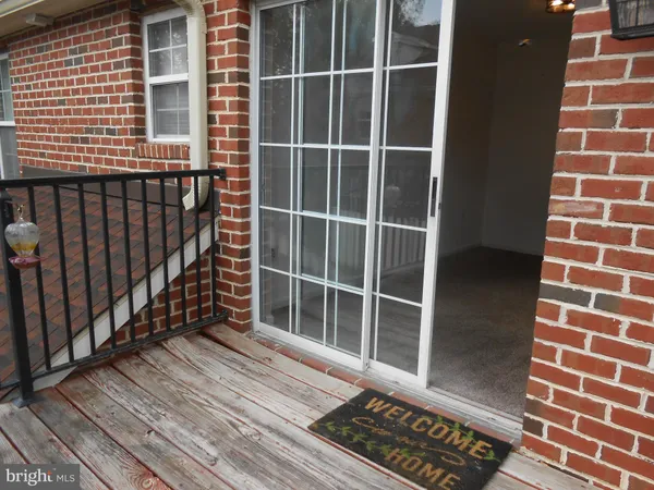 a view of a balcony with a window