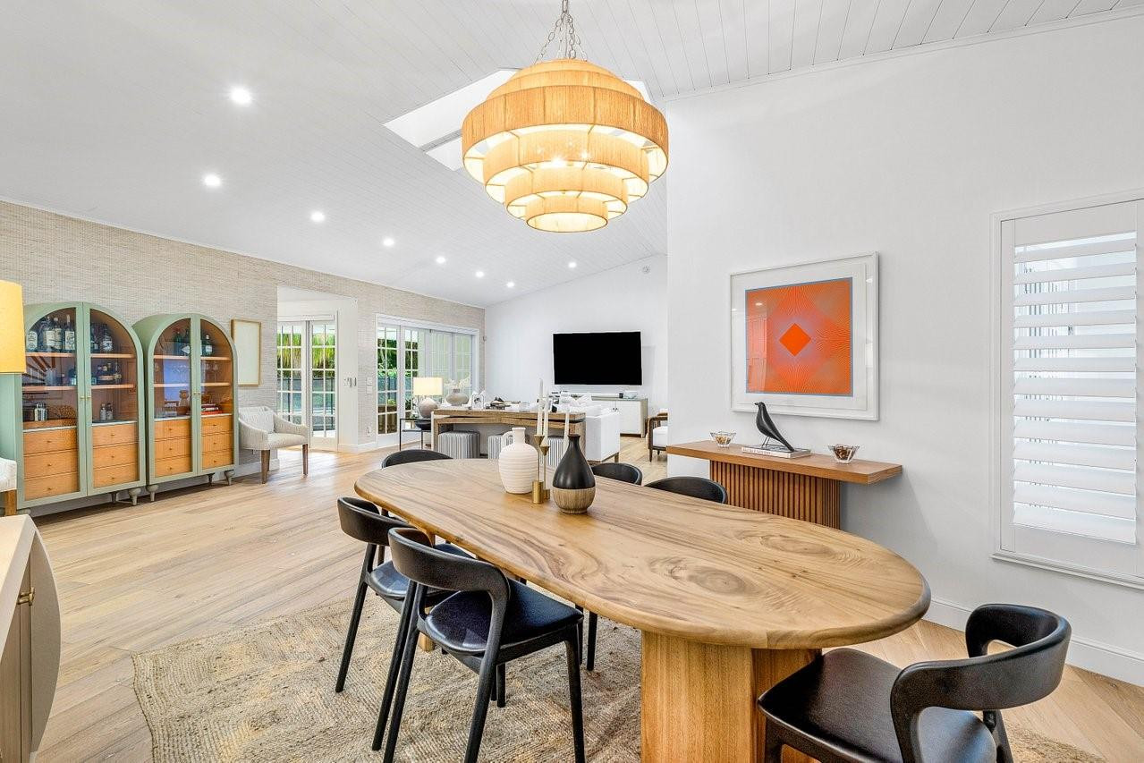 17844 Scarsdale Way Boca Raton, FL 33496 - Photo 11 of 38 a dining room with furniture a window and a chandelier