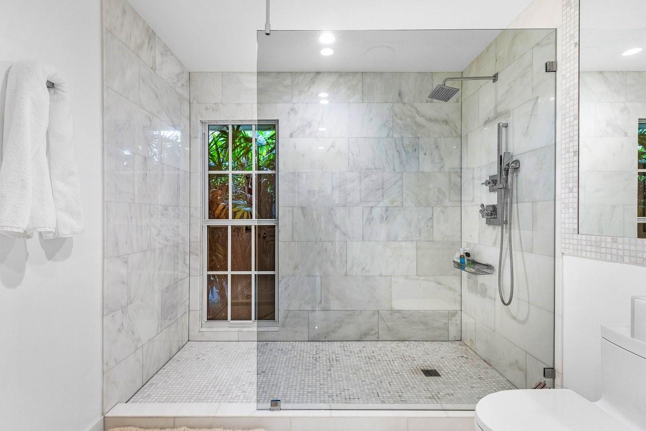 17844 Scarsdale Way Boca Raton, FL 33496 - Photo 18 of 38 a bathroom with a shower and a toilet