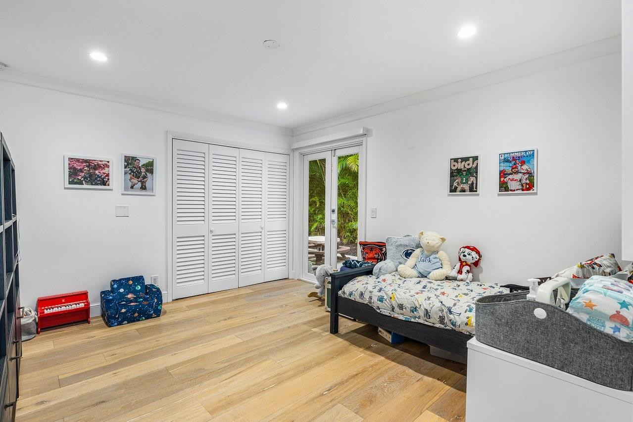 17844 Scarsdale Way Boca Raton, FL 33496 - Photo 20 of 38 a bedroom with furniture and a bed