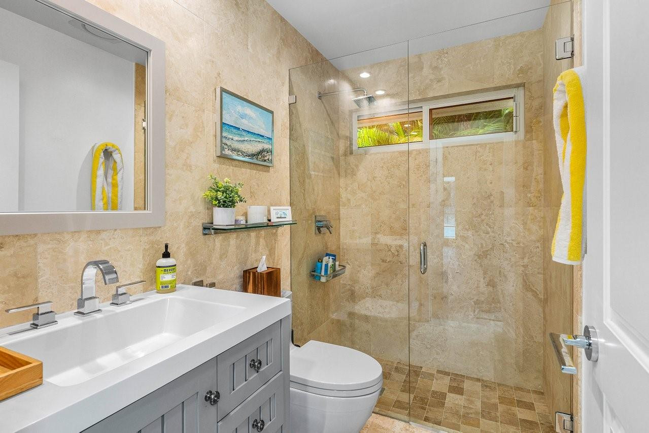 17844 Scarsdale Way Boca Raton, FL 33496 - Photo 21 of 38 a bathroom with a sink a toilet and shower