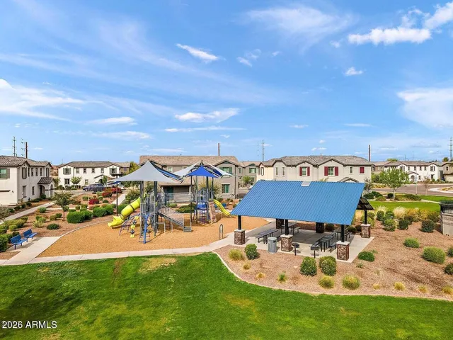an outdoor space with patio and mountain view