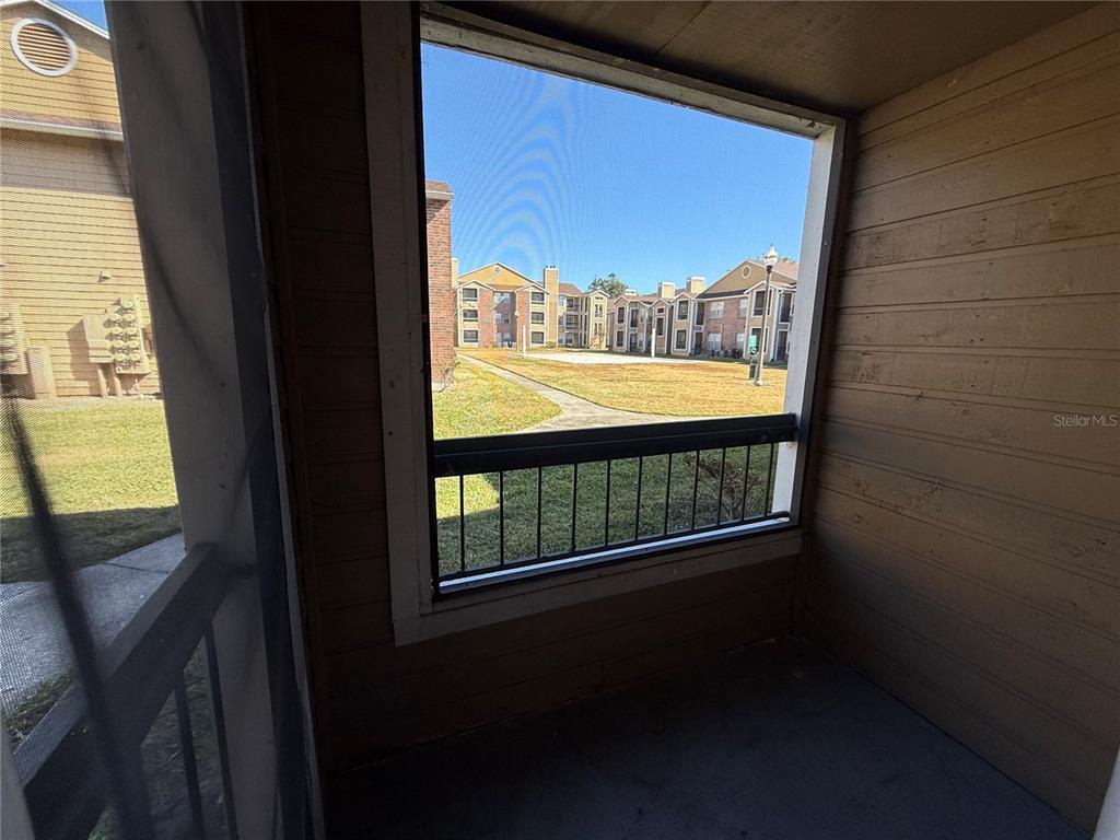 5500 Devonbriar Way, Unit 104 Orlando, FL 32822 - Photo 18 of 24 a view of balcony and window