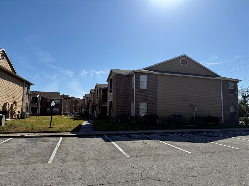5500 Devonbriar Way, Unit 104 Orlando, FL 32822 - Photo 24 of 24 a view of a back yard