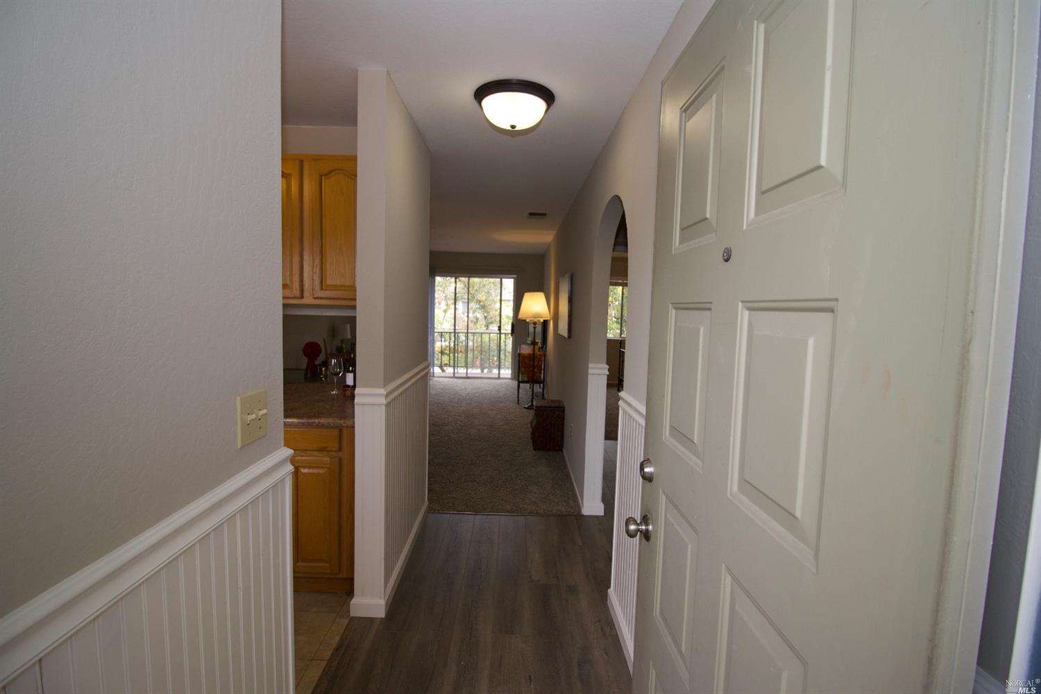 1312 Gold Way Rohnert Park, CA 94928 - Photo 1 of 1 a view of a hallway with wooden floor and staircase