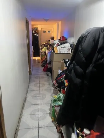 a bed room with a bed and a mirror