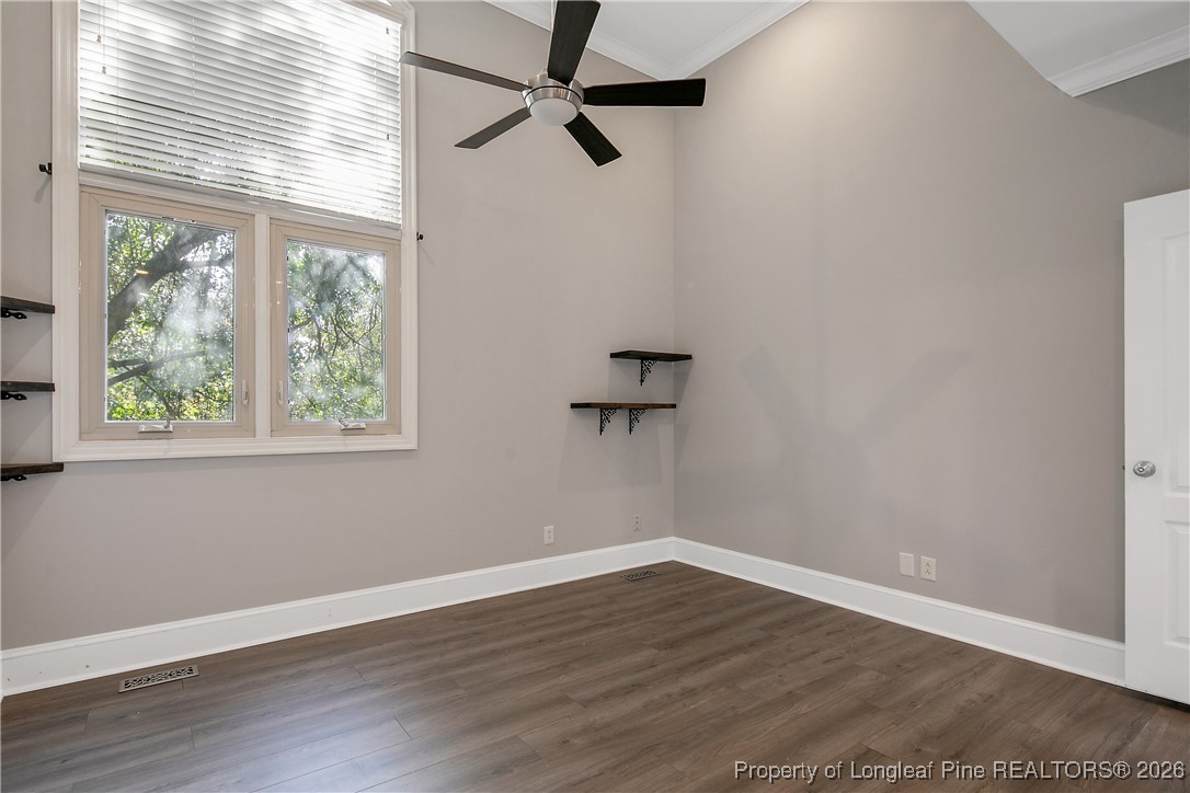 1915 Morganton Road Fayetteville, NC 28305 - Photo 20 of 48 a view of a room with wooden floor and windows