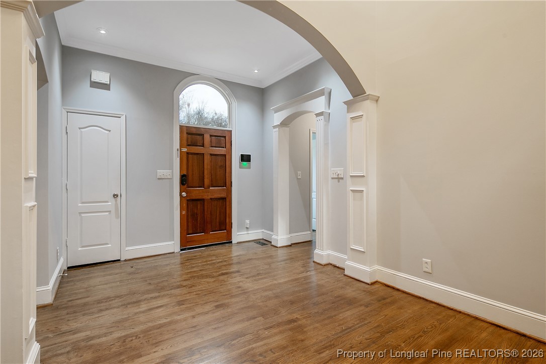 1915 Morganton Road Fayetteville, NC 28305 - Photo 5 of 48 an empty room with wooden floor closet and windows