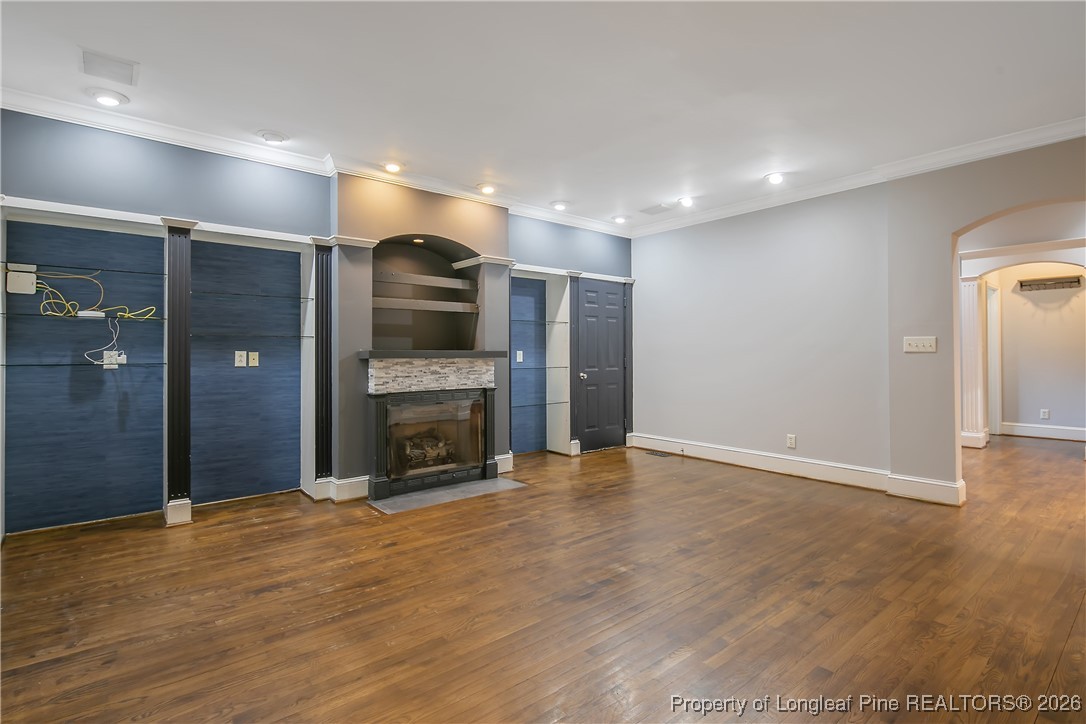 1915 Morganton Road Fayetteville, NC 28305 - Photo 8 of 48 a view of an empty room with a fireplace