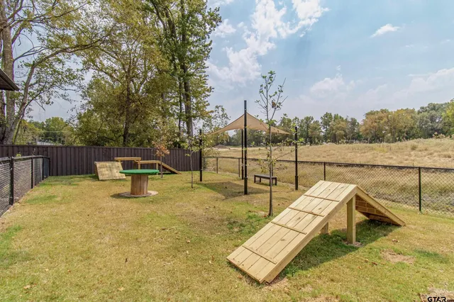 a view of a swimming pool with a lounge chairs