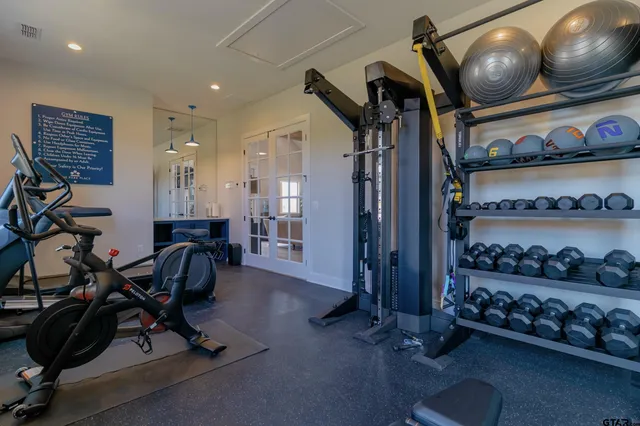 a view of a room with gym equipment