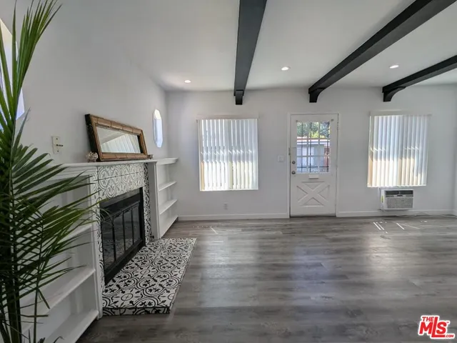 a view of livingroom with furniture and fireplace
