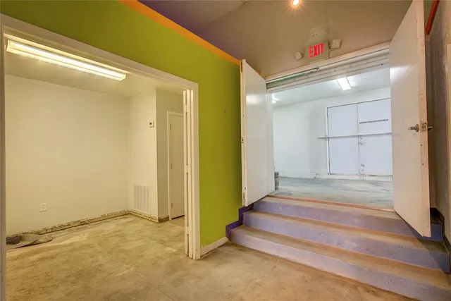 a bathroom with a tub and a sink